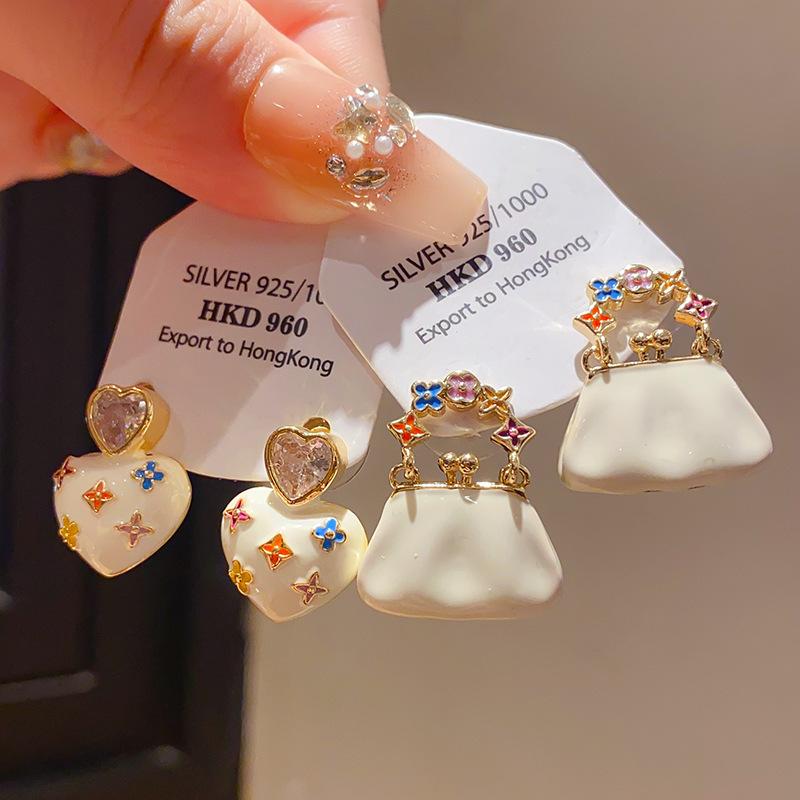 18k真金电镀银针锆石滴油花朵手提包爱心…